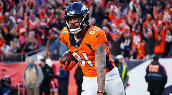 Broncos receiver Tim Patrick celebrates scoring a touchdown.